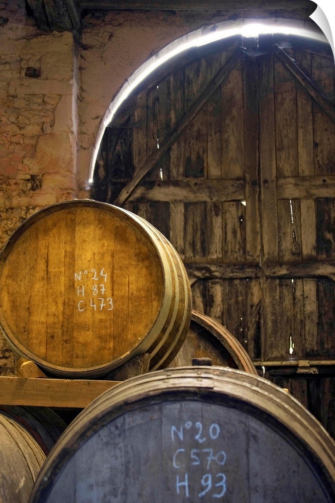 France, Normandy, Calvados barrels in the cellar