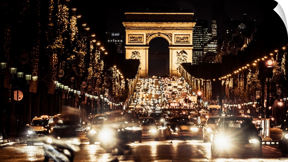 France, Paris, Arc de Triomphe, The avenue Champs-elysees and the Arc de Triomphe at night.