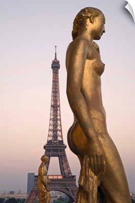 France, Paris, Gilded statue at Palais de Chaillot and Eiffel Tower