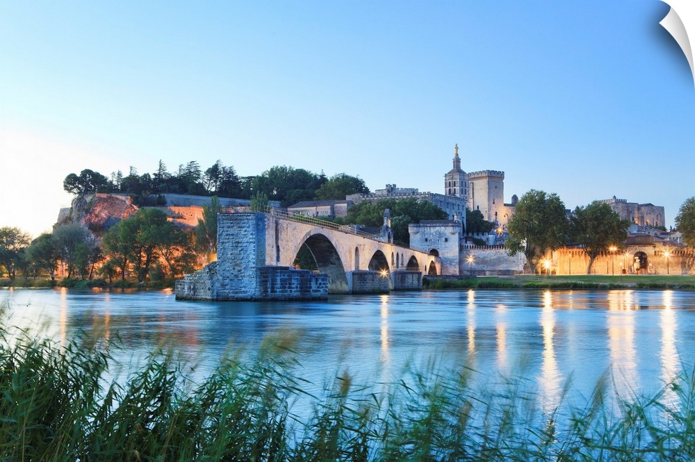 France, Provence, Avignon, The old Pont Sant Benezet on the Rhone river with Pope Palace (Palais des Papes) in the back.