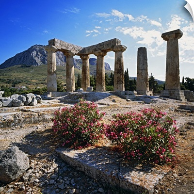 Greece, Corinth, Doric temple of Apollo, fortress of Acrocorintho in background