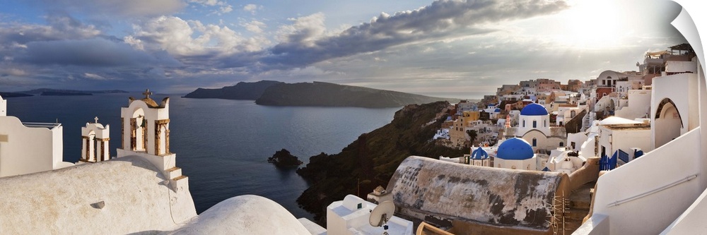 Greece, Aegean islands, Cyclades, Santorini island, Greek Islands, Oia village, typical church bells overlooking the sea.