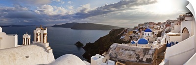 Greece, Santorini island, Oia village, typical church bells overlooking the sea