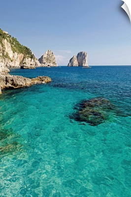 Italy, Campania, Capri, Marina Piccola beach, view towards Faraglioni