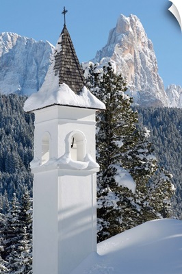 Italy, Dolomites, church and Pale di San Martino range in background