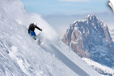 Italy, Freeride ski in Marmolada with Sassolungo Mountain in the background