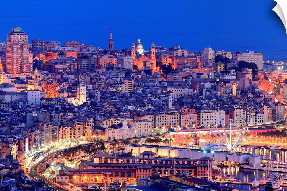 Italy, Liguria, Ligurian sea, Ligurian Riviera, Genova district, Genova, Genoa, Harbor and the town illuminated at dusk.