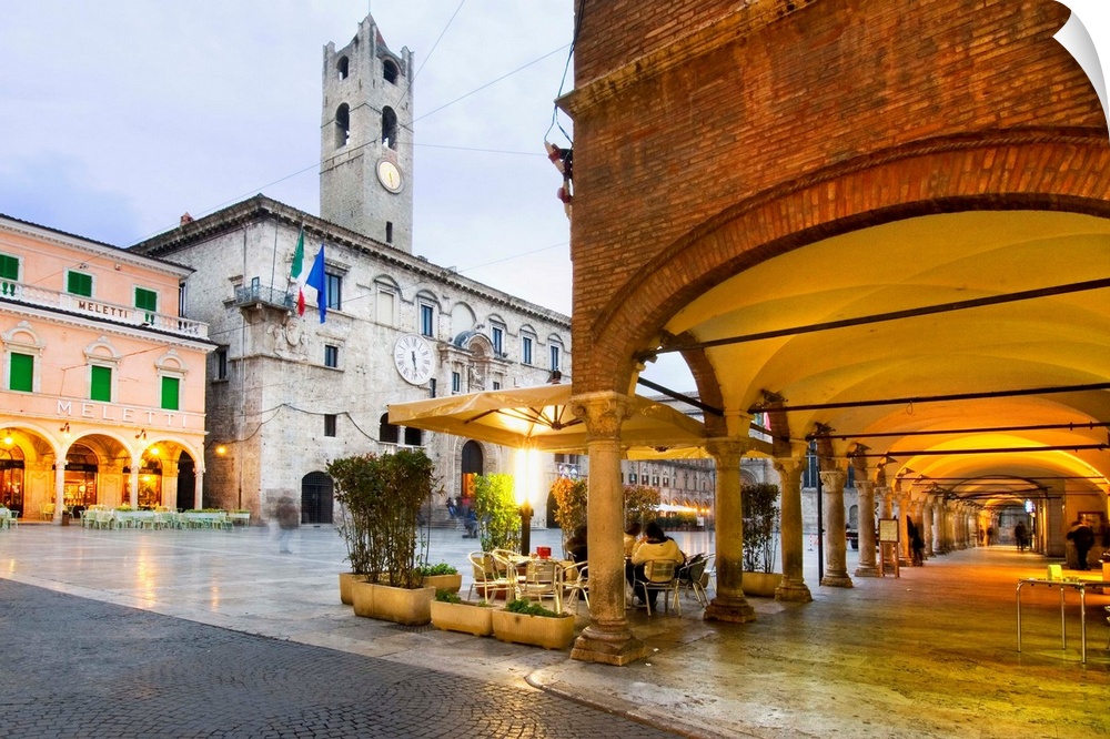 Italy, Marches, Ascoli Piceno, Piazza del Popolo colonnade and Palazzo dei Capitani del Popolo