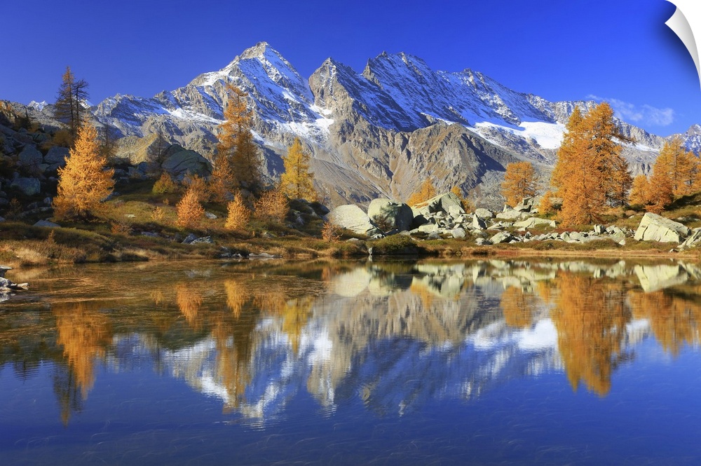 Italy, Piedmont, Torino district, Valle dell'Orco, Ceresole Reale, Alps, Le Levanne are reflected in one of the Bellagarda...