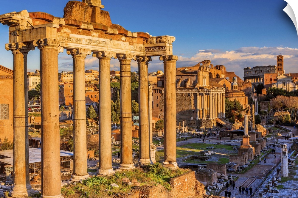 Italy, Latium, Roma district, Rome, Roman Forum, Foro Romano Temple of Saturn, Coliseum in the background.