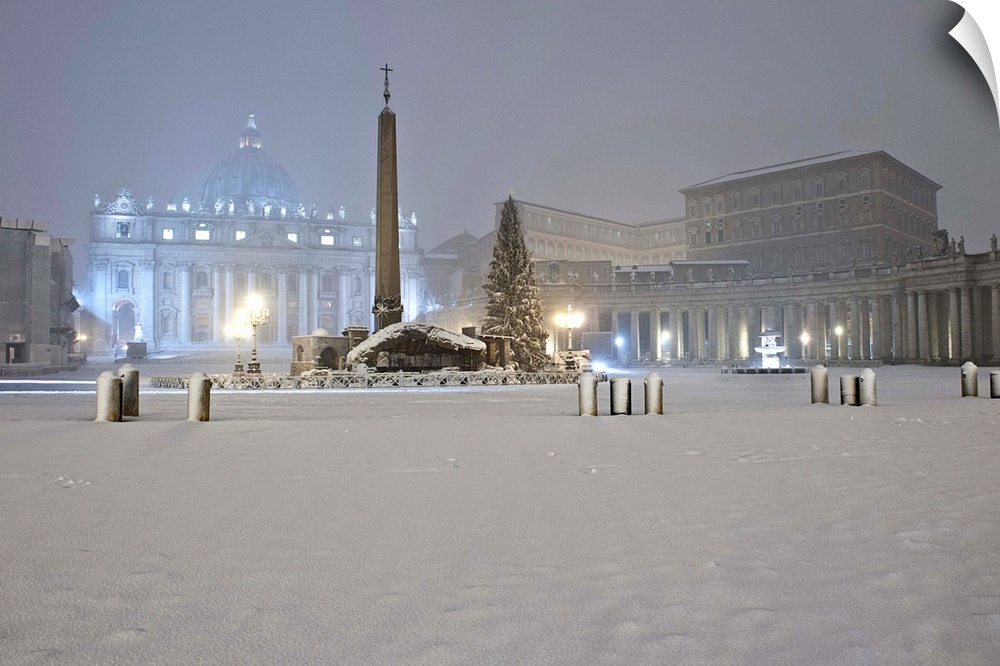 Italy, Rome, St Peter's Basilica, Night view of the Square with snow.