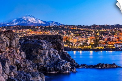 Italy, Sicily, Ognina, Mediterranean sea, Lava stone rocks with Mt Etna