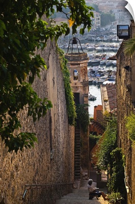 Italy, Tuscany, Maremma, steep footstep leading to the harbour in Porto Ercole