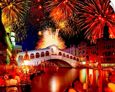 Italy, Venice, Rialto Bridge at night with fireworks