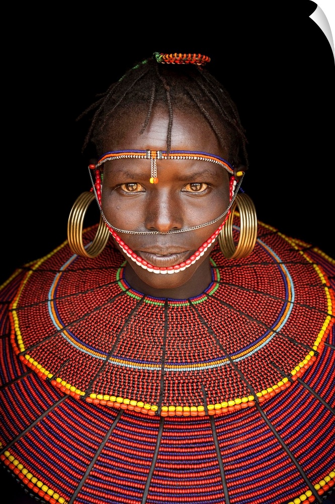 Kenya, Central, Pokot girl in traditional clothing.