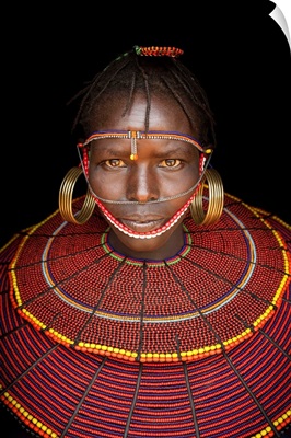 Kenya, Central, Pokot girl in traditional clothing