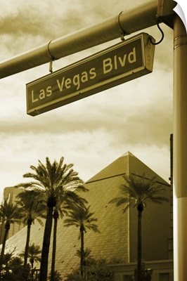 Nevada, Las Vegas, Street name sign and Luxor Hotel and Casino