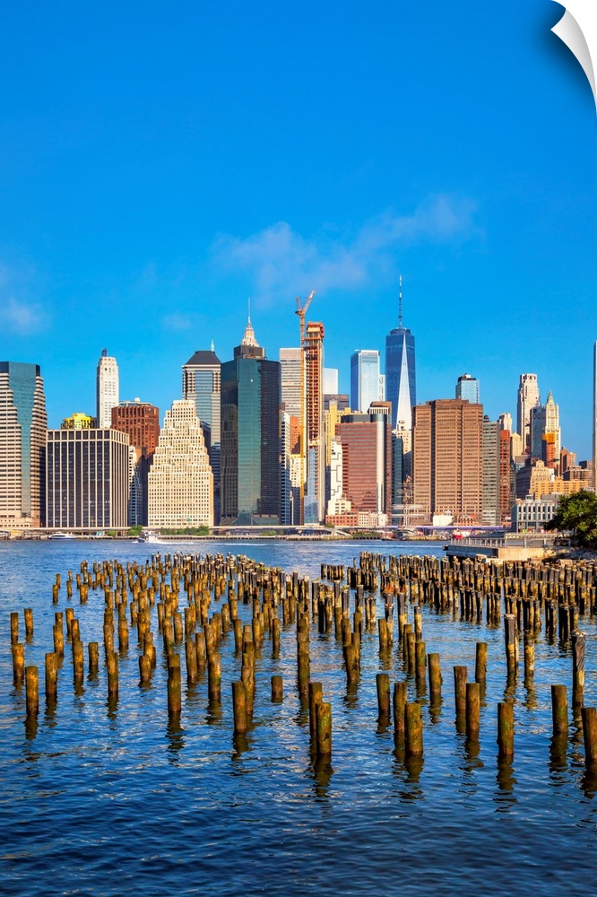 New York City, Brooklyn, Brooklyn Bridge Park, wooden piles, Lower Manhattan Financial District skyline skyscraper..