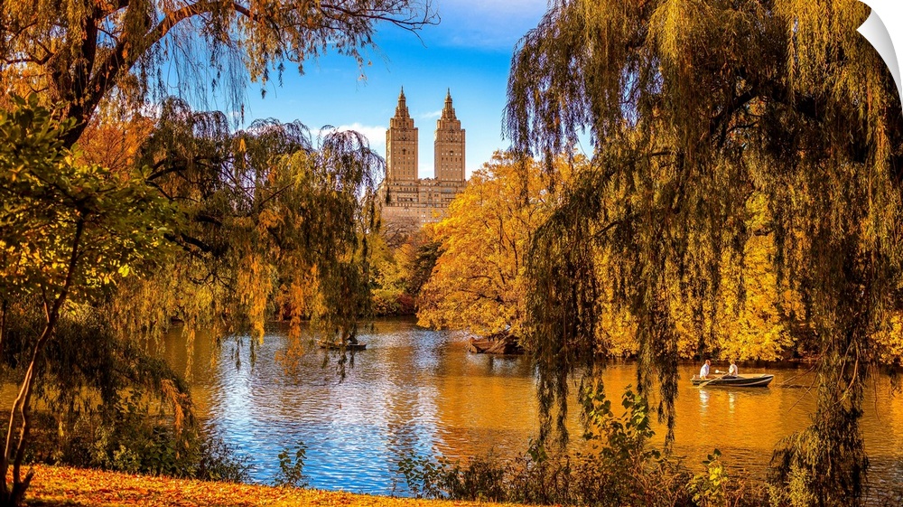 USA, New York City, Manhattan, Central Park, The lake and San Remo apartment building, foliage.