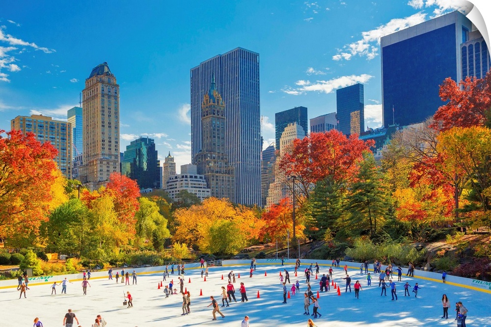 USA, New York City, Manhattan, Central Park, Wollman Rink, Ice rink, Fifth Avenue skyline in the background.