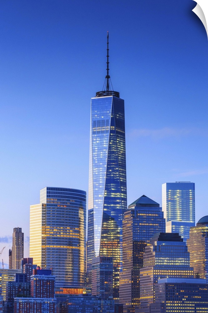 USA, New York City, Manhattan, Lower Manhattan, One World Trade Center, Freedom Tower, Lower Manhattan buildings illuminat...