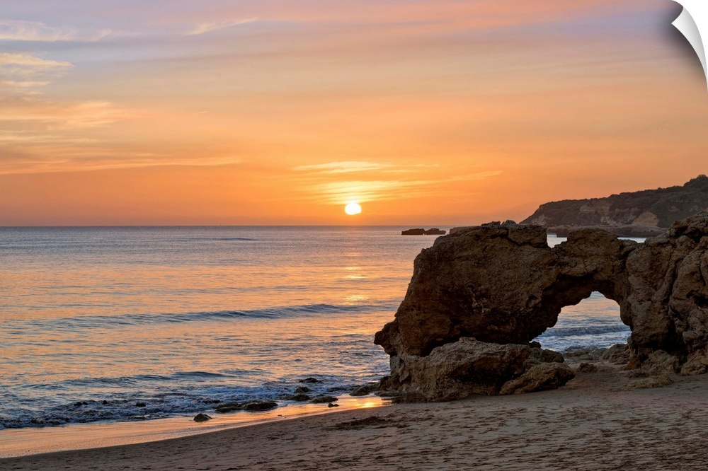 Portugal, Faro, Algarve, Albufeira, Praia da Oura Beach at sunset.