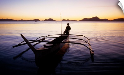 Southeast Asia, Philippines, Palawan, El Nido, outrigger boat (sampang) at sunset