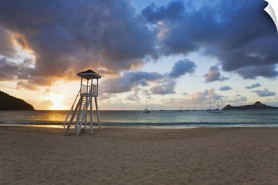 St Lucia, Gros Islet, Rodney Bay, Reduit Beach sunset, Pigeon Island in the background