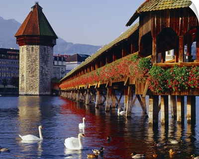 Switzerland, the covered wooden bridge and octagonal water tower