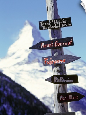 Switzerland, Valais, Zermatt, road signs and Matterhorn mountain in background