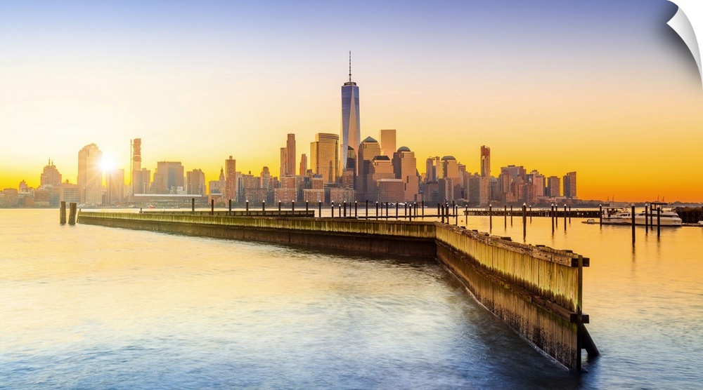 USA, New Jersey, Lower Manhattan skyline with One World Trade Center and Freedom Tower at sunrise