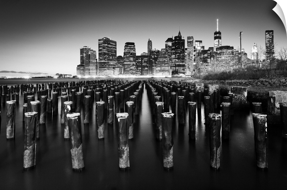 USA, New York City, Lower Manhattan, View at dusk towards downtown Manhattan from Brooklyn Bridge Park.