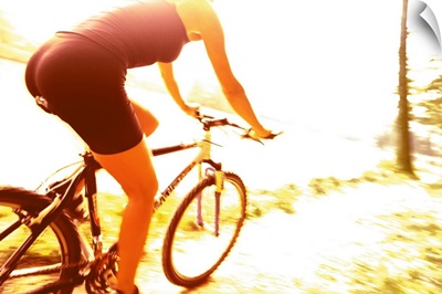 Young woman mountain biking