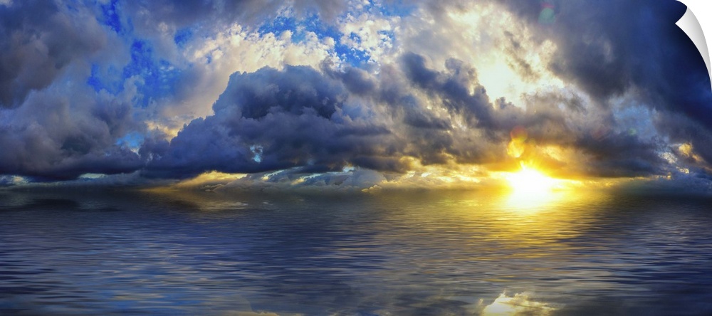 An amazing blue cloudscape within a panoramic sunset with a blue sky reflected in the ocean waters.