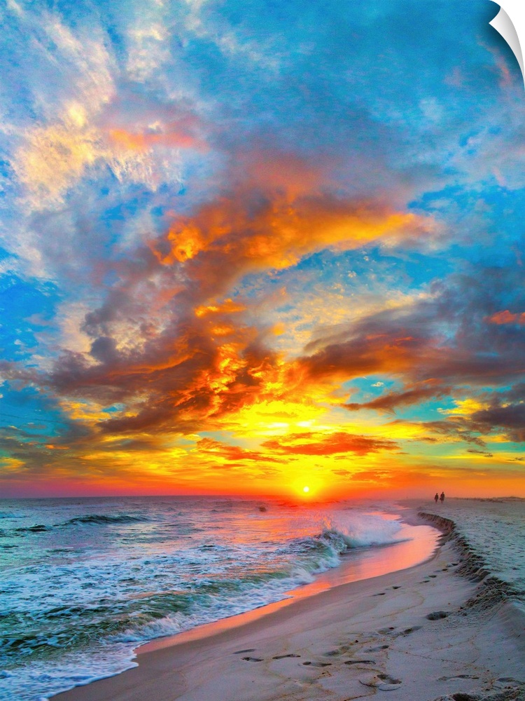 A dark shoreline before a bright burning red sunset.  Landscape taken on Navarre Beach, Florida.