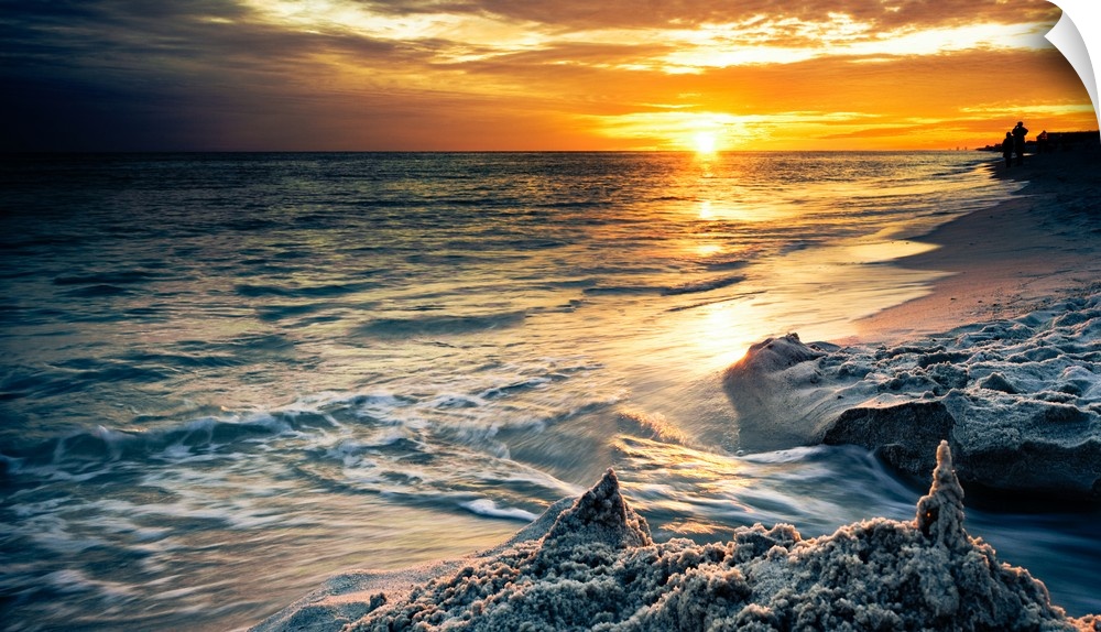 A drip sandcastle in a Destin Florida Sunset on the beach.