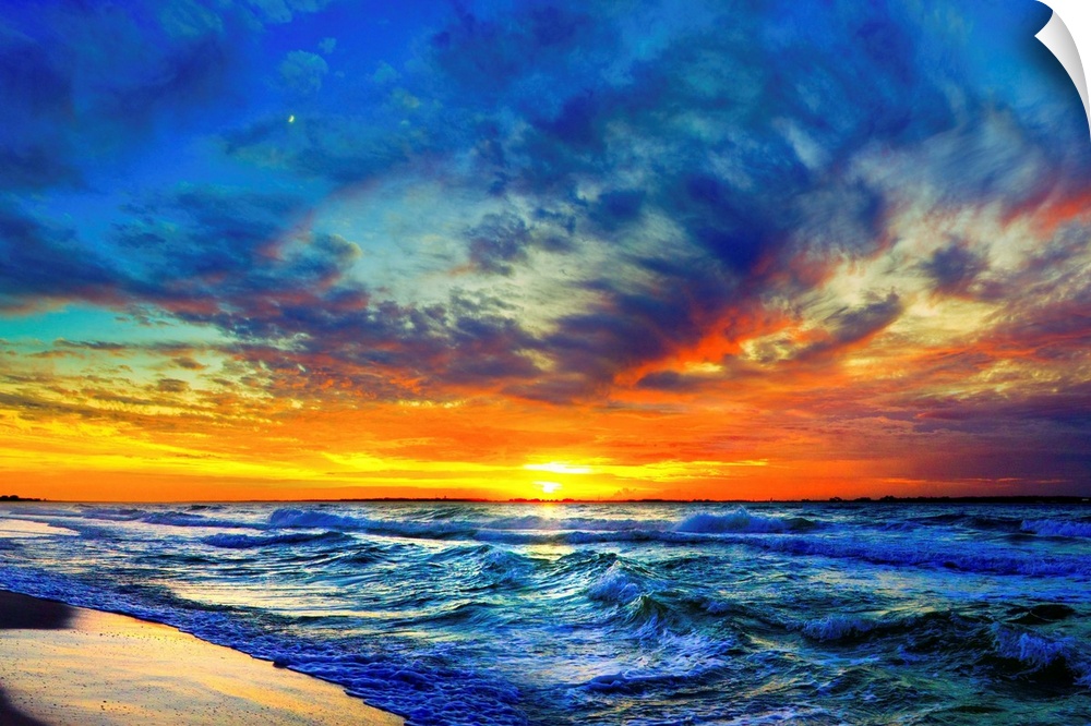 Dark yellow, orange, and red sunset on the beach. Landscape taken on Navarre Beach, Florida.