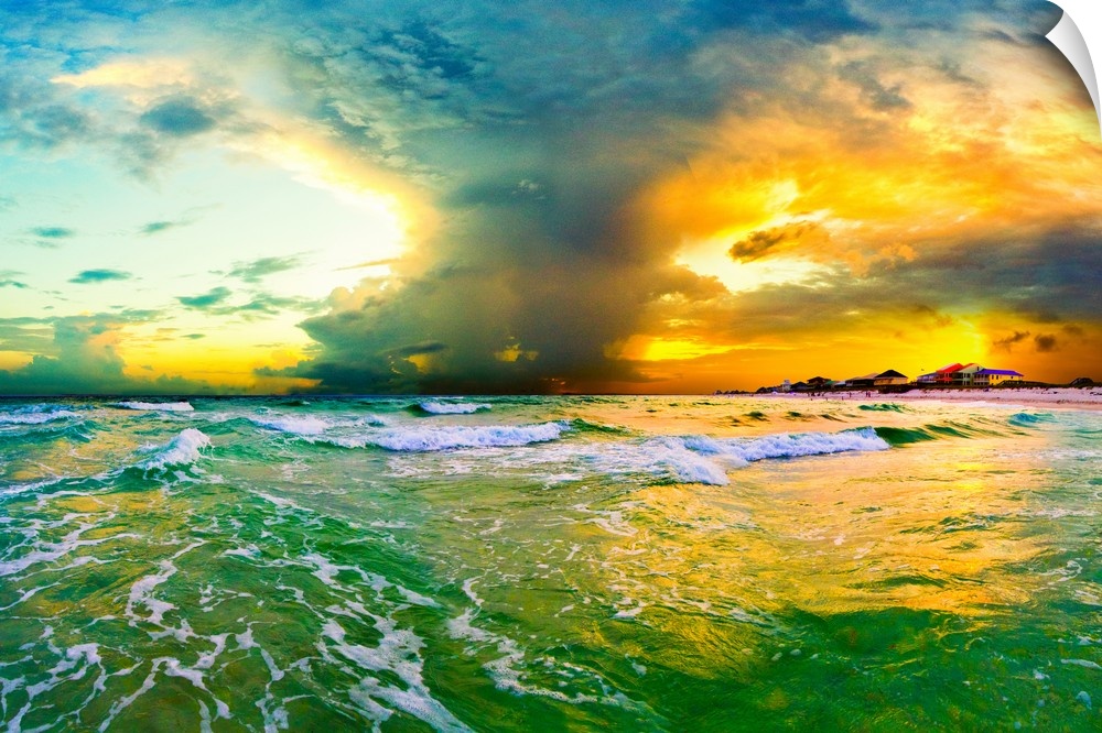 A cloud plume over a green seascape. Green waves crash onto the sandy sea shore. Landscape taken on Navarre Beach, Florida.