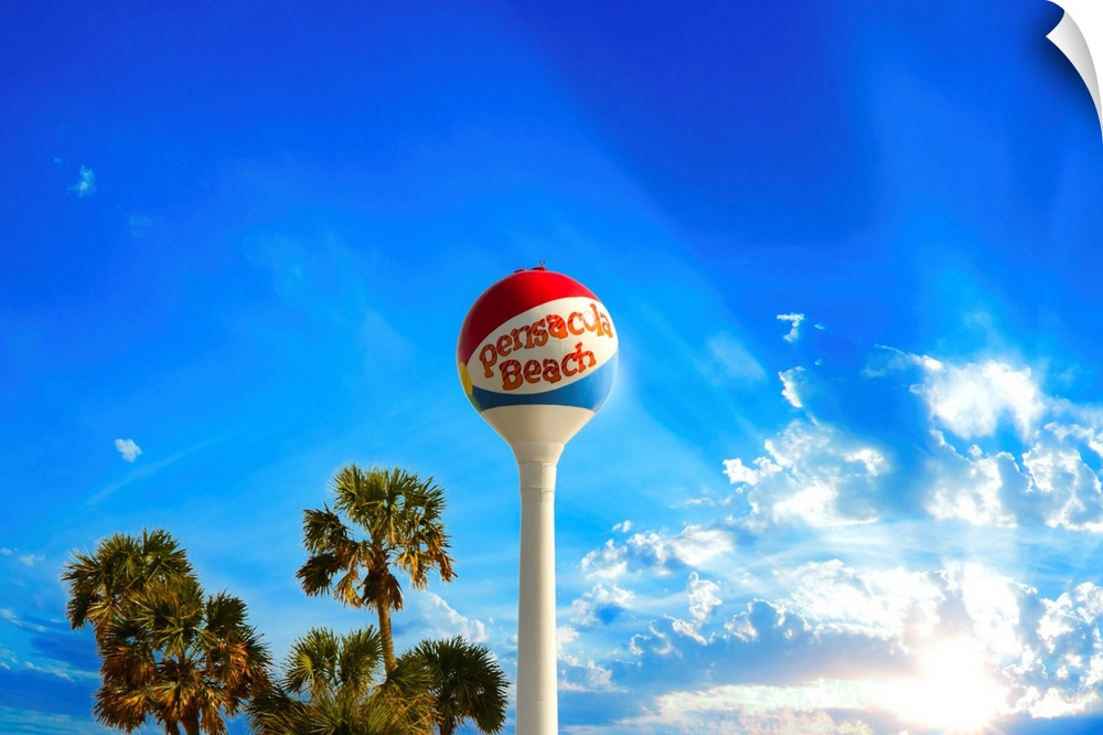 Pensacola Beach Ball Water Tower and Palm Trees in this skyscape.