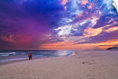 Pink Purple Clouds Sunset Walking Down Beach