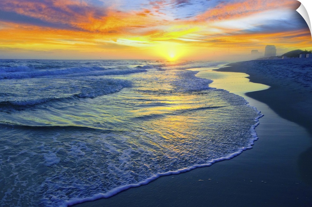 Dark yellow and red sunset on the beach. Landscape taken on Navarre Beach, Florida.