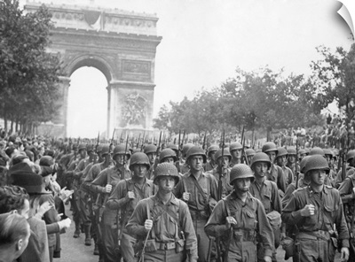 American troops marched down the Champs Elysees to the cheers of Parisians