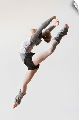 Ballerina Leaping In Mid-Air