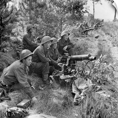 British troops at action stations ready to provide covering fire for the infantry