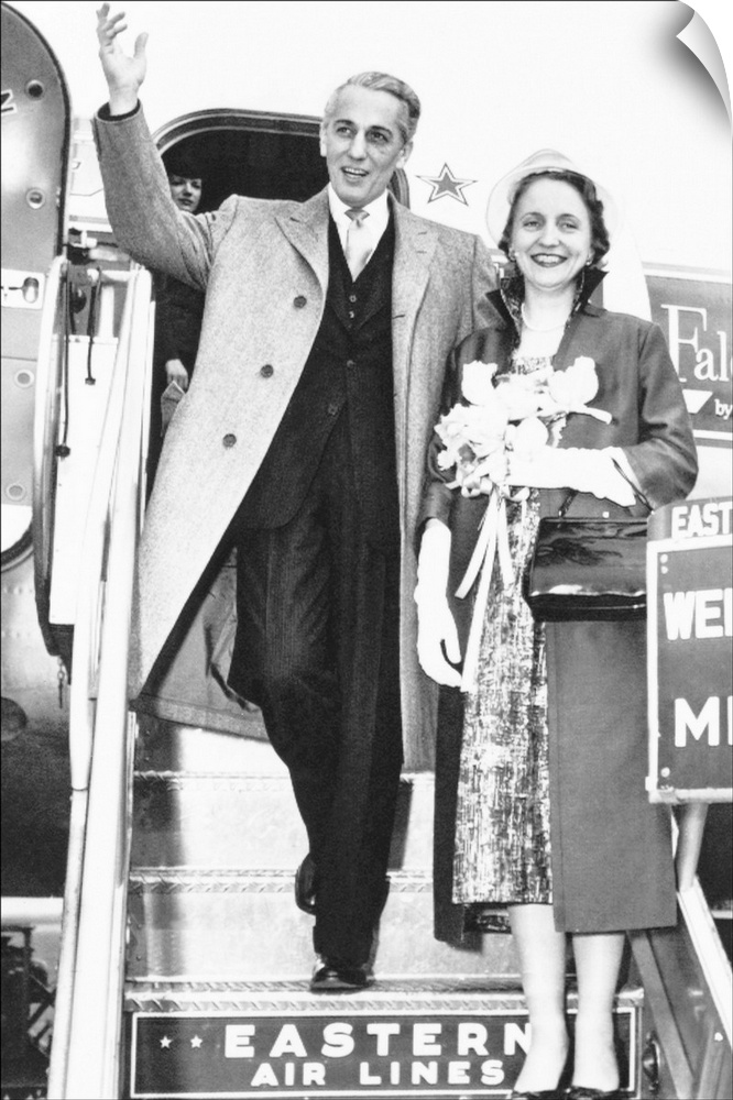 Clifton Daniel, Jr. waves to crowd gathered at Miami to see his new bride, former Margaret Truman. The couple were enroute...