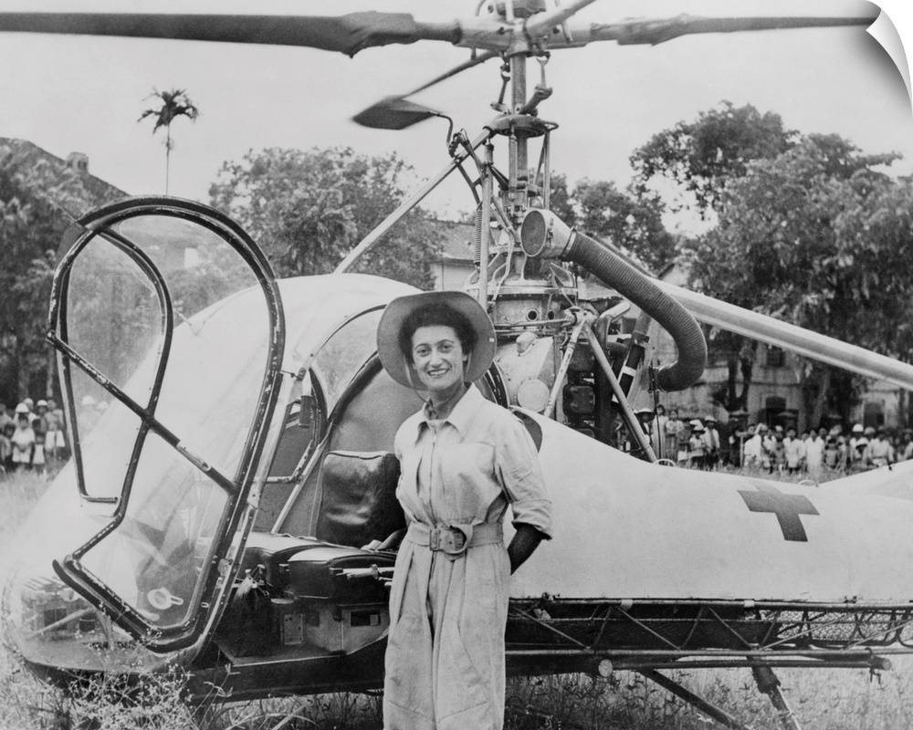 Dr. Valerie Andre, in front of her helicopter in Tonkin, Vietnam, in 1952. She served in the French army as a neurosurgeon...