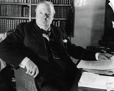 Former Prime Minister Prime Winston Churchill, at his desk in Werterham, Kent