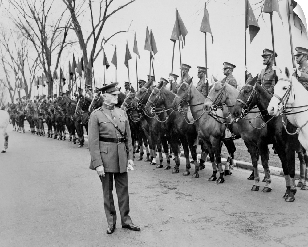 General John Pershing reviewing 'Buffalo Soldiers' of the African American Tenth Cavalry. Ft. Myer, Virginia, 1932.