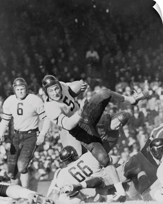 George McAfee, Chicago Bears, sliding off Washington Redskins tackle for seven yards