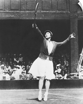 Helen Wills Moody returning a high one during her match